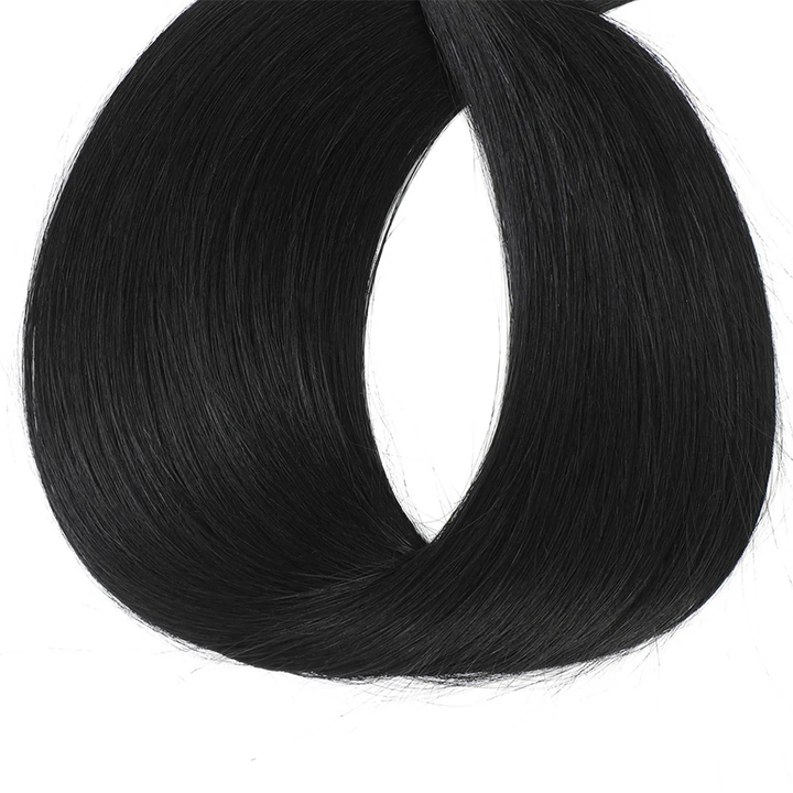 Black Human Hair Extension In A Circular Shape On A White Background