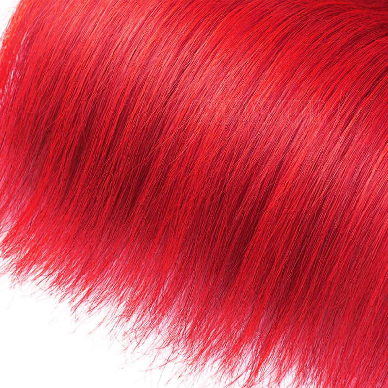 A Close-Up Of Red Hair Strands With A Glossy Finish, Shown Against A Plain White Background.
