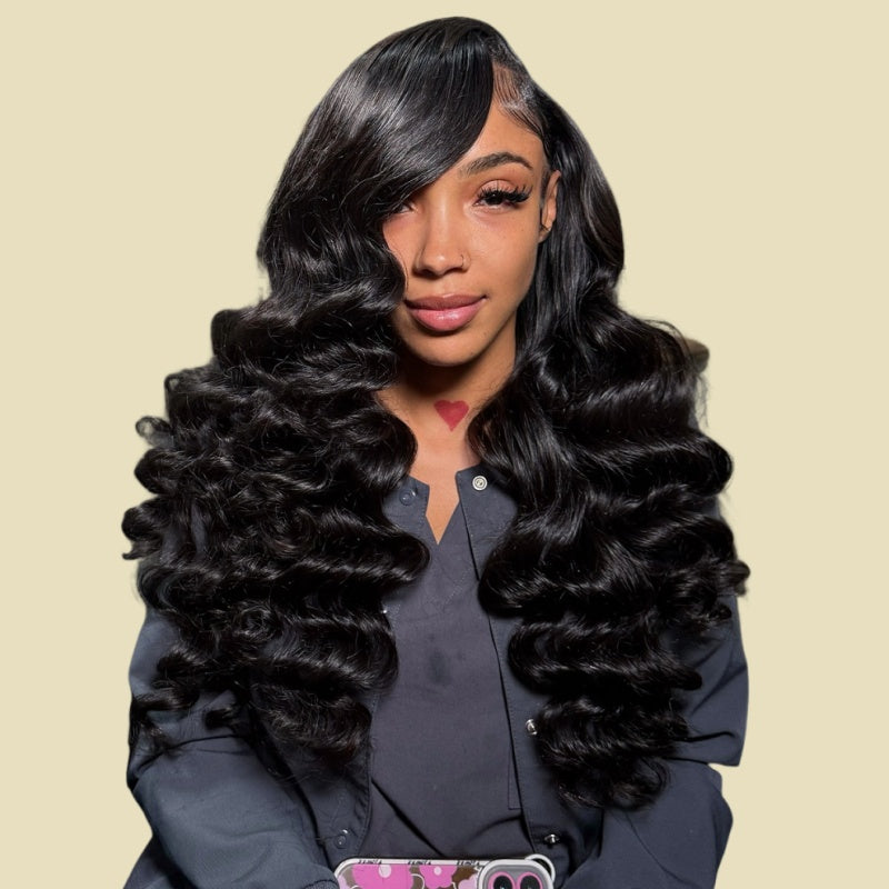 Woman Wearing Black Loose Deep Wave Custom Wig On A Beige Background