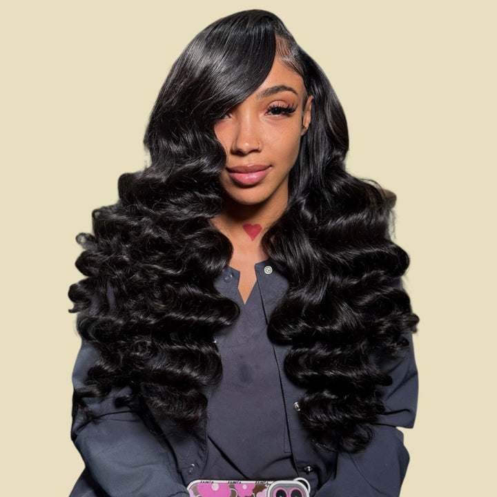 Woman Wearing Black Loose Deep Wave Custom Wig On A Beige Background