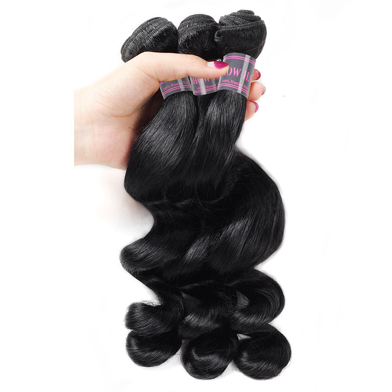 Three Bundles of Peruvian Loose Wave Hair in Natural Black Color, Showcasing Soft Waves