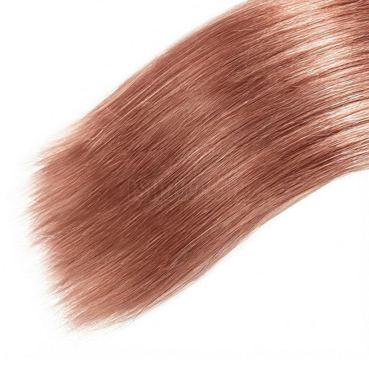A Close-Up Swatch Of Straight, Smooth Hair In A Pink Shade Against A Plain White Background.