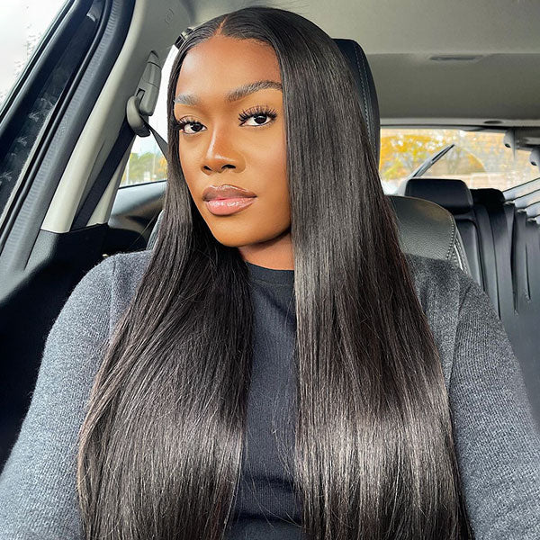 Woman With Long Straight Natural Black Hair in a Car