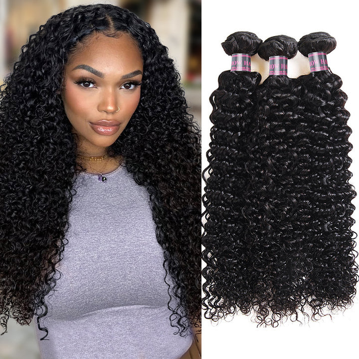 Woman With Curly Human Hair Bundles Wearing a Gray Top