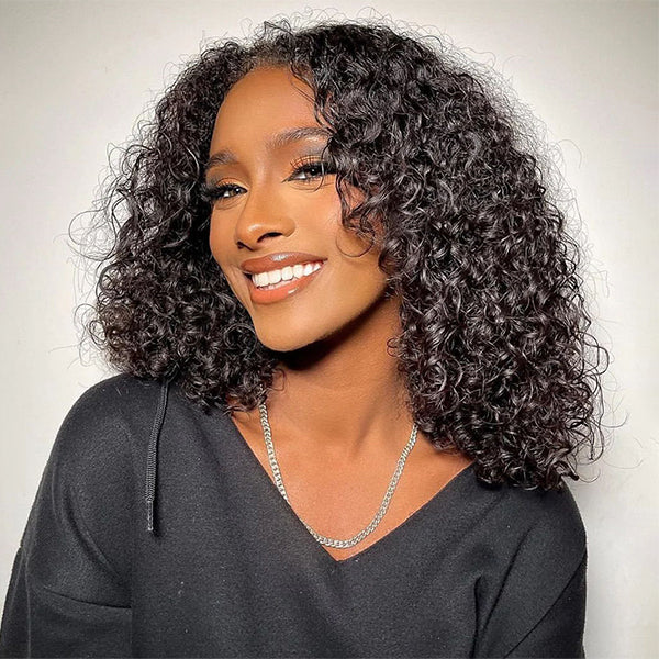 Smiling Woman With Curly Hair Wearing a Black Hoodie and Silver Necklace