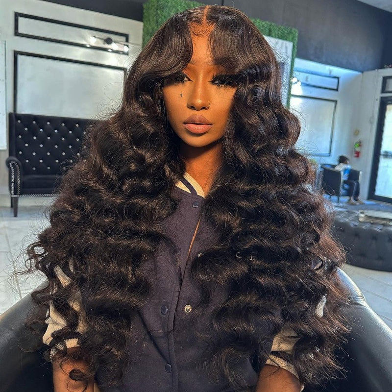 Model Showcasing Loose Deep Wave Human Hair Wig in Hair Salon