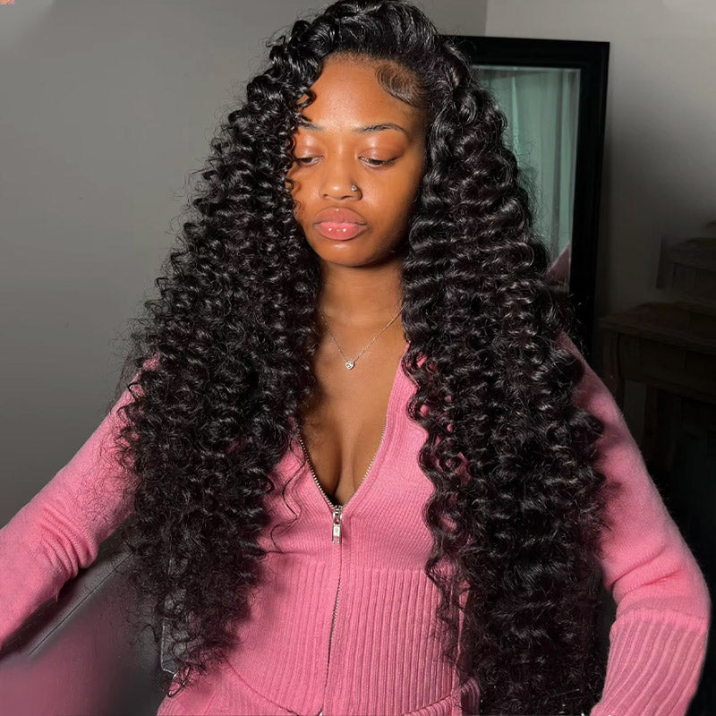 Model Displaying Loose Wave Bundles in Natural Black Hair, Styled With Soft Curls